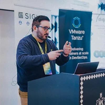 Davide Imola presenting at a conference